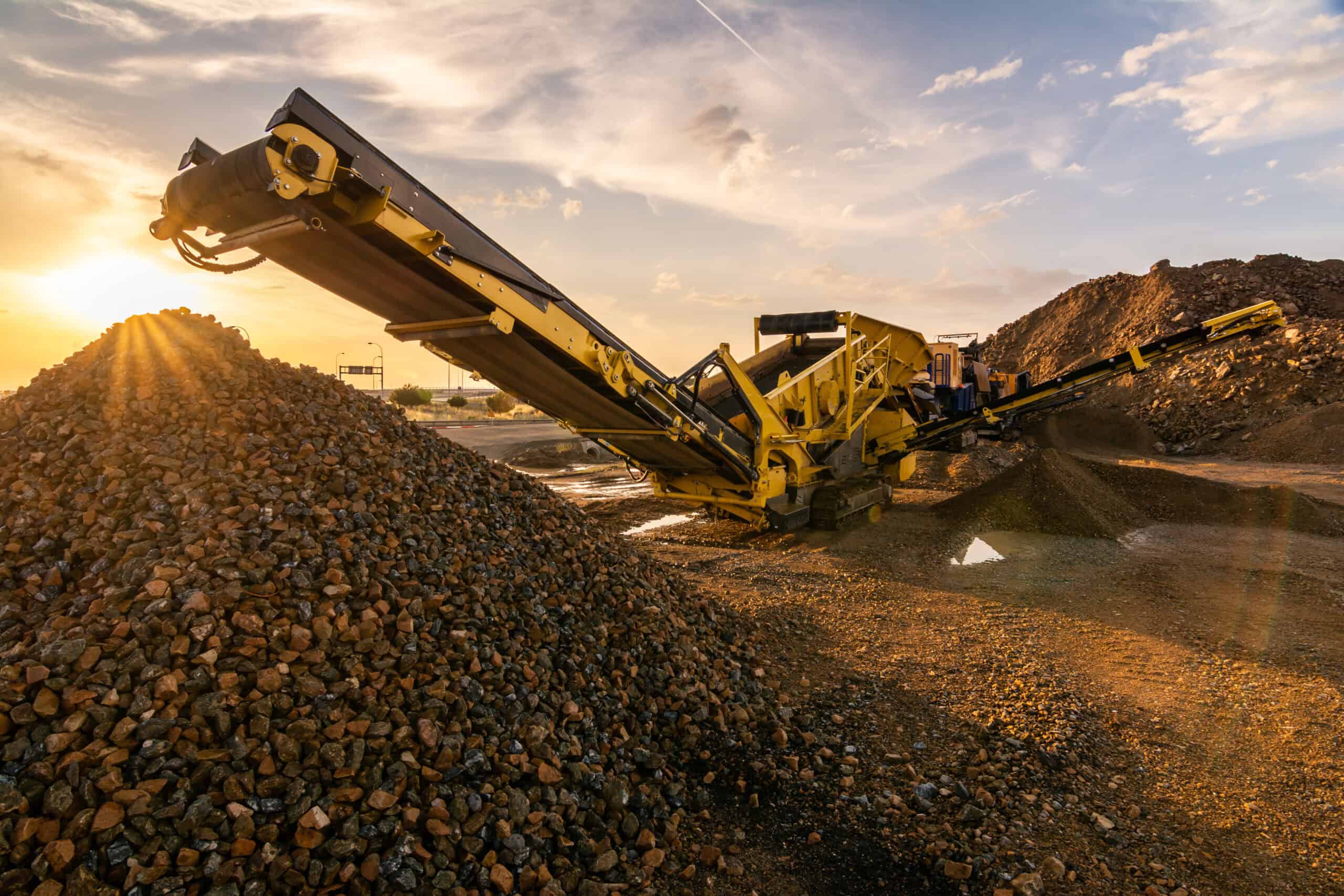 Heavy and mobile machinery in a quarry to transform stone into c