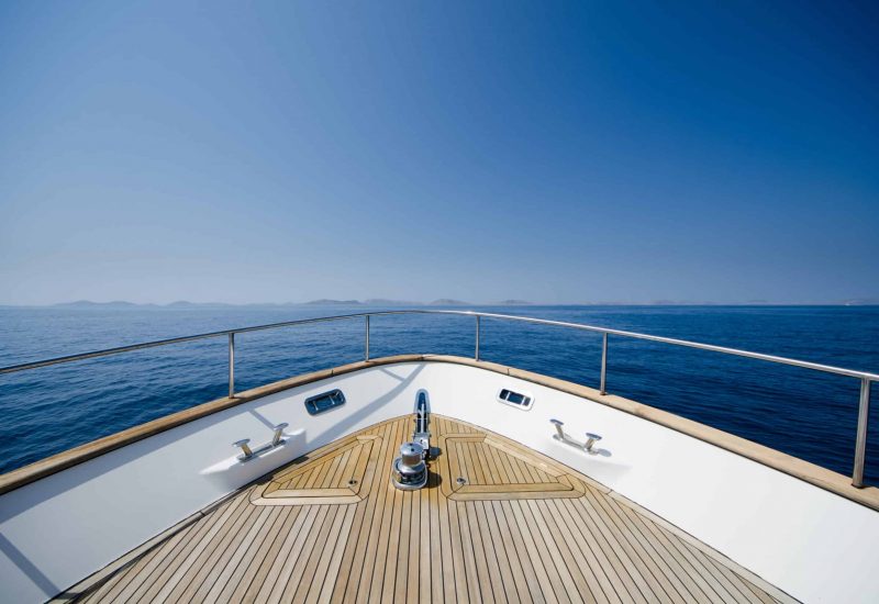 Wide angle shot of front of the yacht in summer time