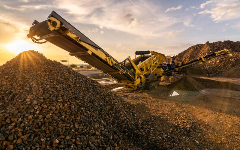 Heavy and mobile machinery in a quarry to transform stone into c